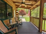 Enjoy the Rocking Chairs on the Covered Wood Deck